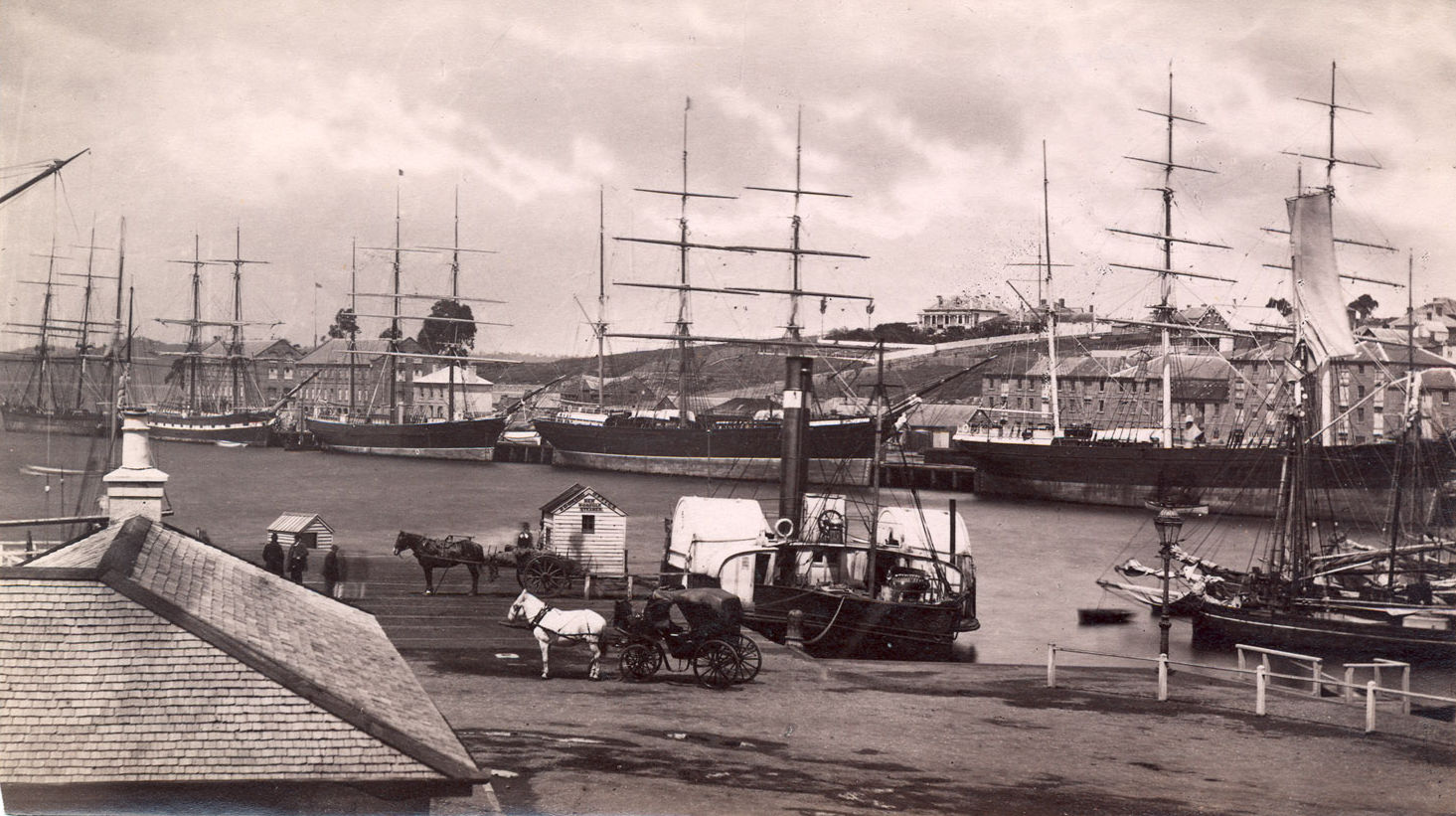 Photograph of Hobart waterfront with view of ships and Salamanca warehouses c. 1870