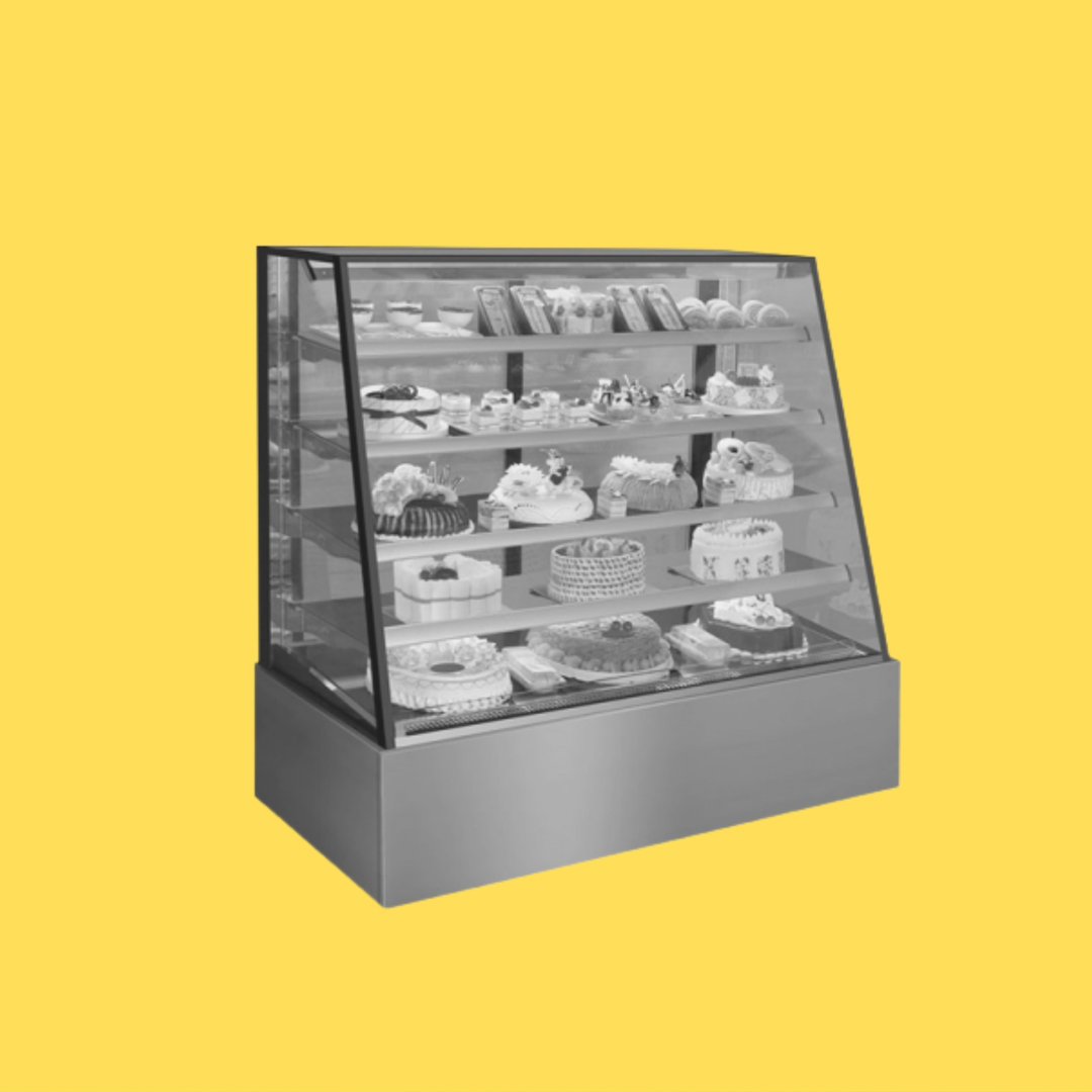 A cake display in black and white filled with cakes sits on a pale yellow background.